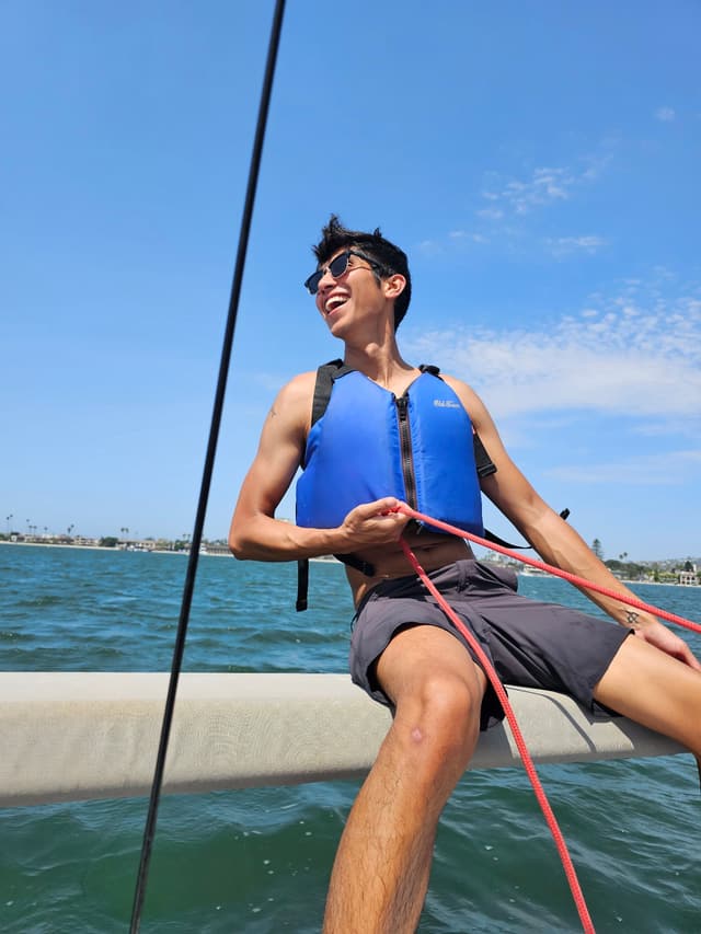 Luis Meraz sailing on the water