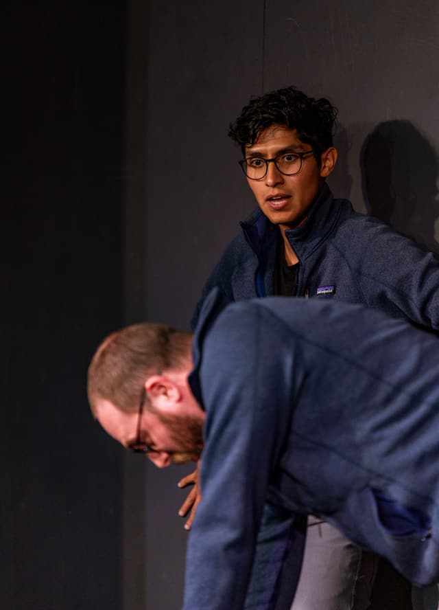 Luis Meraz and Zach reacting in Smackdown